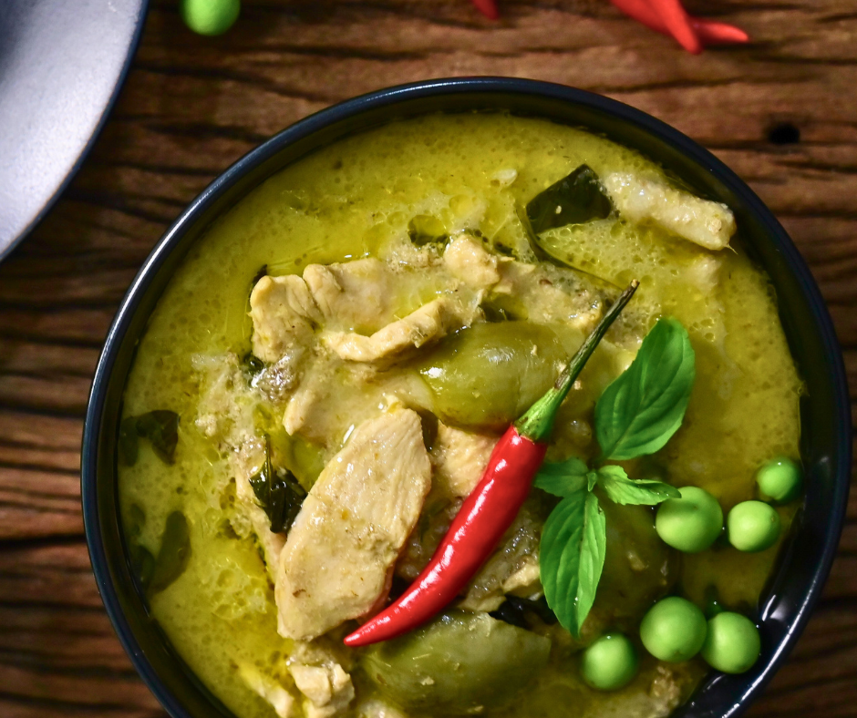 Green Thai Curry in a Hurry made with leftover turkey, served in a bowl with vibrant herbs, slices of lime, and aromatic garnishes, ready for a cosy weeknight meal